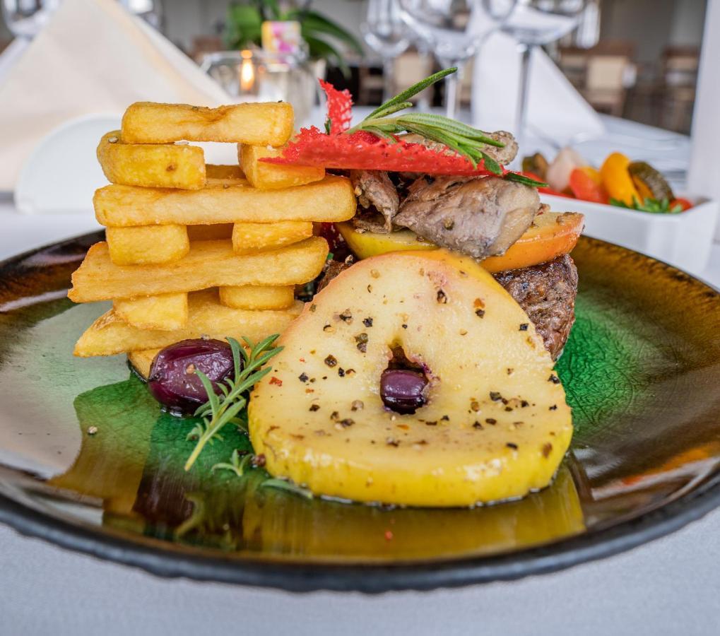 Boutique Odyseja & Spa Ciechocinek Εξωτερικό φωτογραφία A plate of food