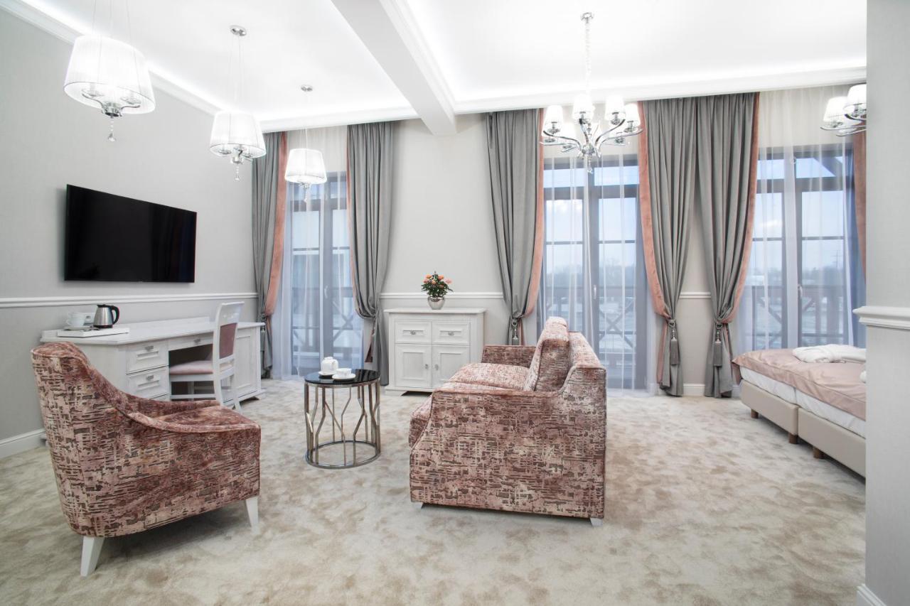 Boutique Odyseja & Spa Ciechocinek Εξωτερικό φωτογραφία A bedroom in the hotel