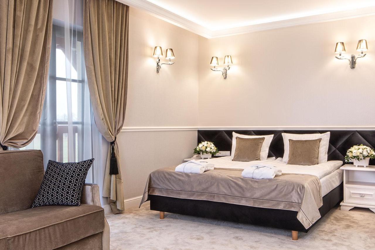 Boutique Odyseja & Spa Ciechocinek Εξωτερικό φωτογραφία A bedroom at the hotel