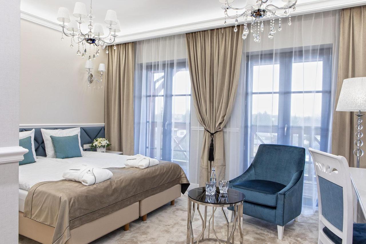 Boutique Odyseja & Spa Ciechocinek Εξωτερικό φωτογραφία A bedroom in the hotel