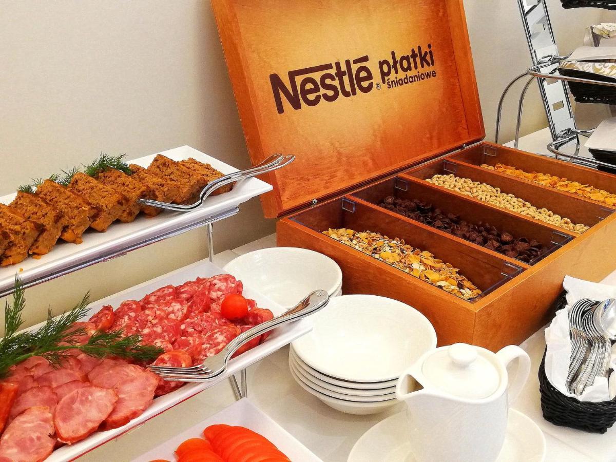 Boutique Odyseja & Spa Ciechocinek Εξωτερικό φωτογραφία Nestlé breakfast